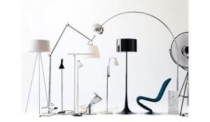 Modern floor lamp collection featuring contemporary designs, minimalist metal frames, and stylish lighting fixtures in a bright studio setting.