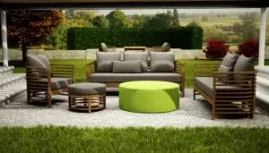 Modern outdoor furniture set with wooden frames, gray cushions, and a bright green round table on a patio garden.