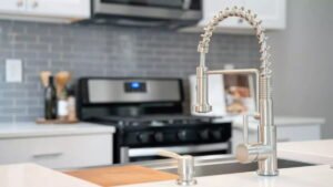 Modern stainless steel Faucets Kitchen Faucets with pull-down spray in a sleek contemporary kitchen