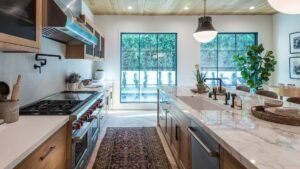 Modern Fresh Kitchen with marble countertops, natural wood cabinets, and large windows for bright natural light
